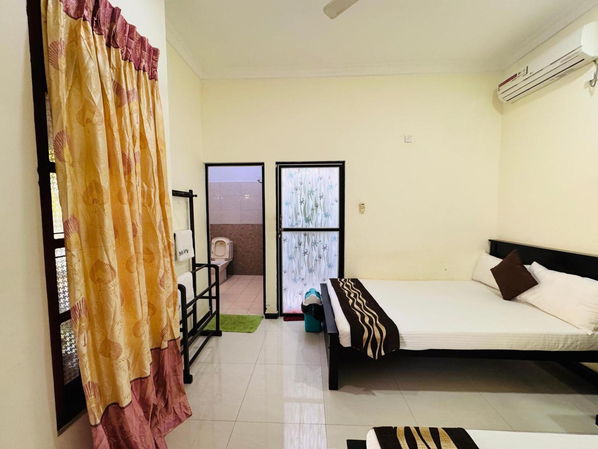 Aa Inn Trincomalee Δωμάτιο φωτογραφία